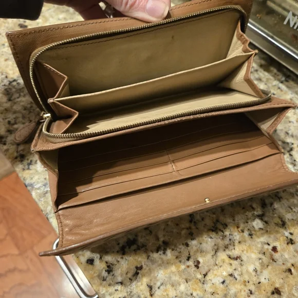 This is a Bottega Veneta Intrecciato Woven Tan Leather Continental Flap Wallet - Picture 6 of 6